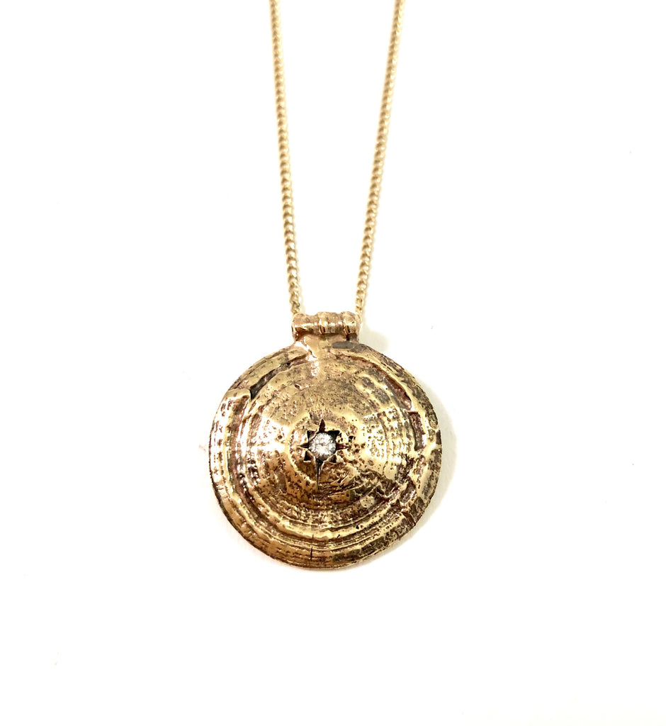 coral medallion pendant