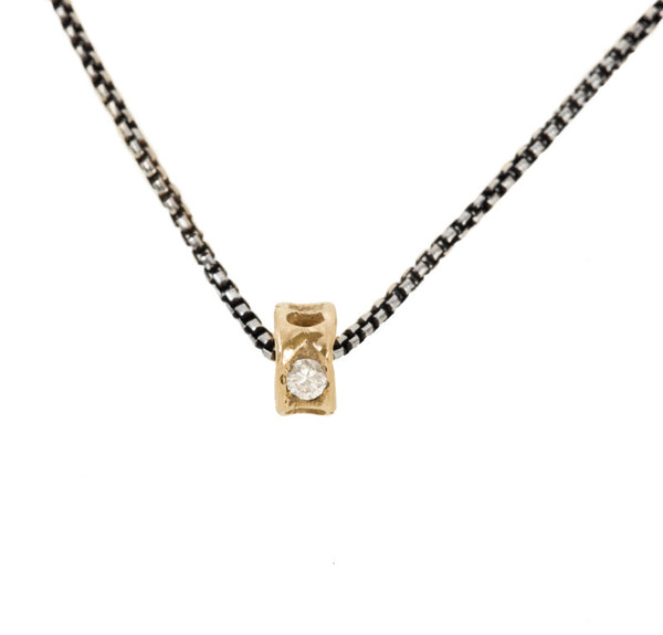 vertebrae bead necklace with 2 diamonds