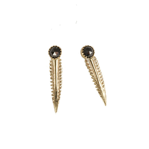 barb tip studs with cabochon stone