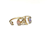 tail fin ring with oval cabochon